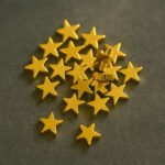 50pcs pkg. Star brass beads, gold plated, in size about 8mm